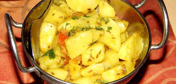 Indische Kartoffelbeilage mit Kümmel und Petersilie ausgarniert!